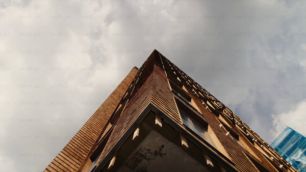 Modern wood building: Low angle view with upward pan of the wooden architecture