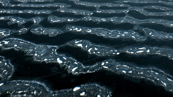 Aerial view of frozen lake in arvidsjaur, Sweden, winter landscape