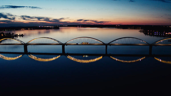 Luleå: Sunset over Bergnäsbron bridge - aerial drone footage
