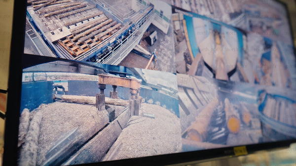 Timber processing at sawmill: Security cameras monitor log transport, cutting, and sorting