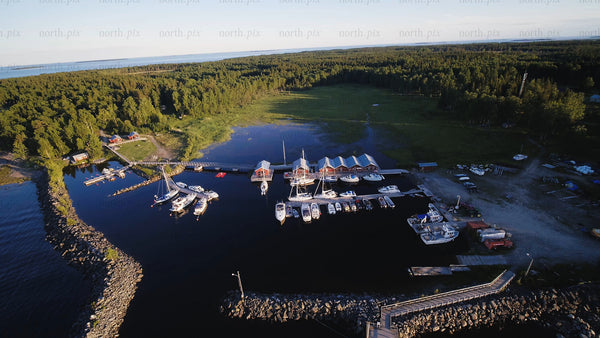 Summer day in junkön archipelago: Aerial view of marina and coastline in Luleå