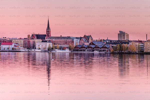 Norra hamn waterfront with church spire at sunset
