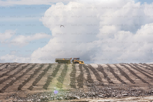 Dump truck on construction site during daytime