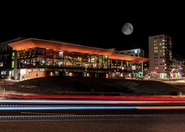 Kulturens hus with moon and light trails at night
