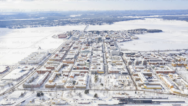 Aerial timelapse of snow-covered Luleå in winter