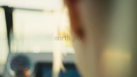 Woman on Boat in Luleå Archipelago at Golden Hour, Summer Evening in Sweden