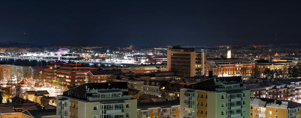 City skyline at night from elevated viewpoint
