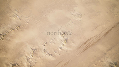 Summer Day in Skvalpen Archipelago: Lone Person Walks on Sandy Beach in Lulea, Sweden