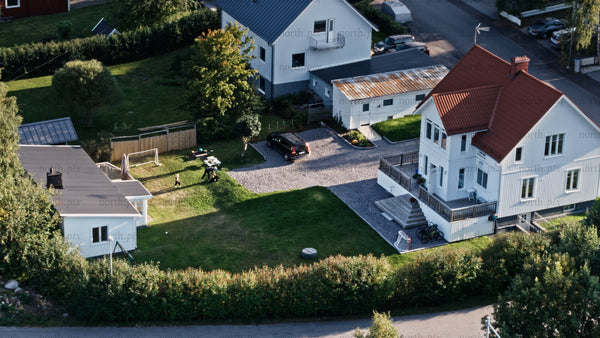 Aerial view of family home in Luleå, on a sunny summer evening