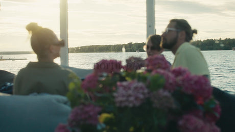 Friends and Family Enjoy a Sunset Boat Tour on the Lulea River in Sweden