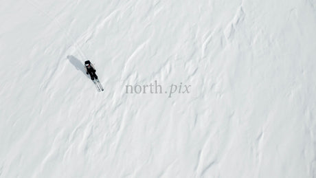 Skier on a Snowy Slope: Winter Sports Adventure