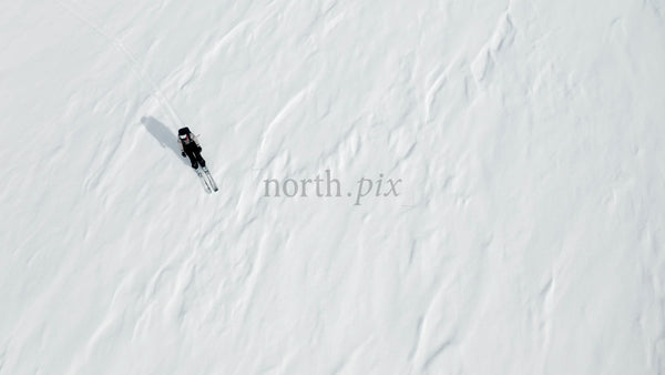 Skier on a Snowy Slope: Winter Sports Adventure