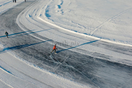Outdoor Ice Skating on Curved Frozen Surface in Luleå City Center, Winter Activity