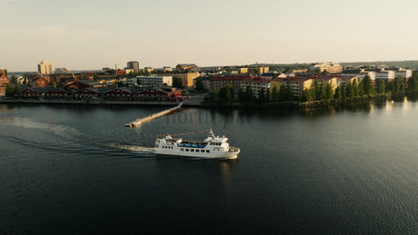 Aerial View of Lulea City Center With Ferry at Sunset During Summer