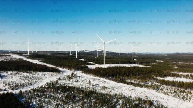 Markbygden wind farm: Aerial view of winter landscape and clean energy generation