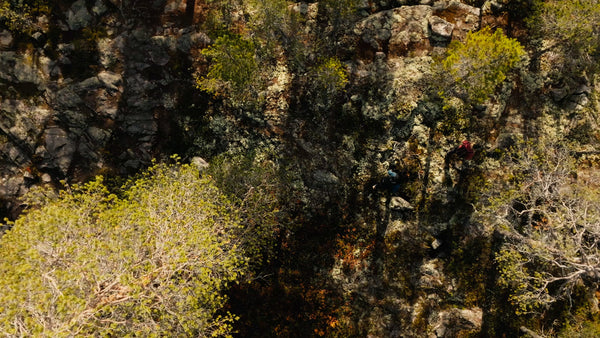 Spring hike: Aerial drone view of hikers in rocky terrain, Luleå