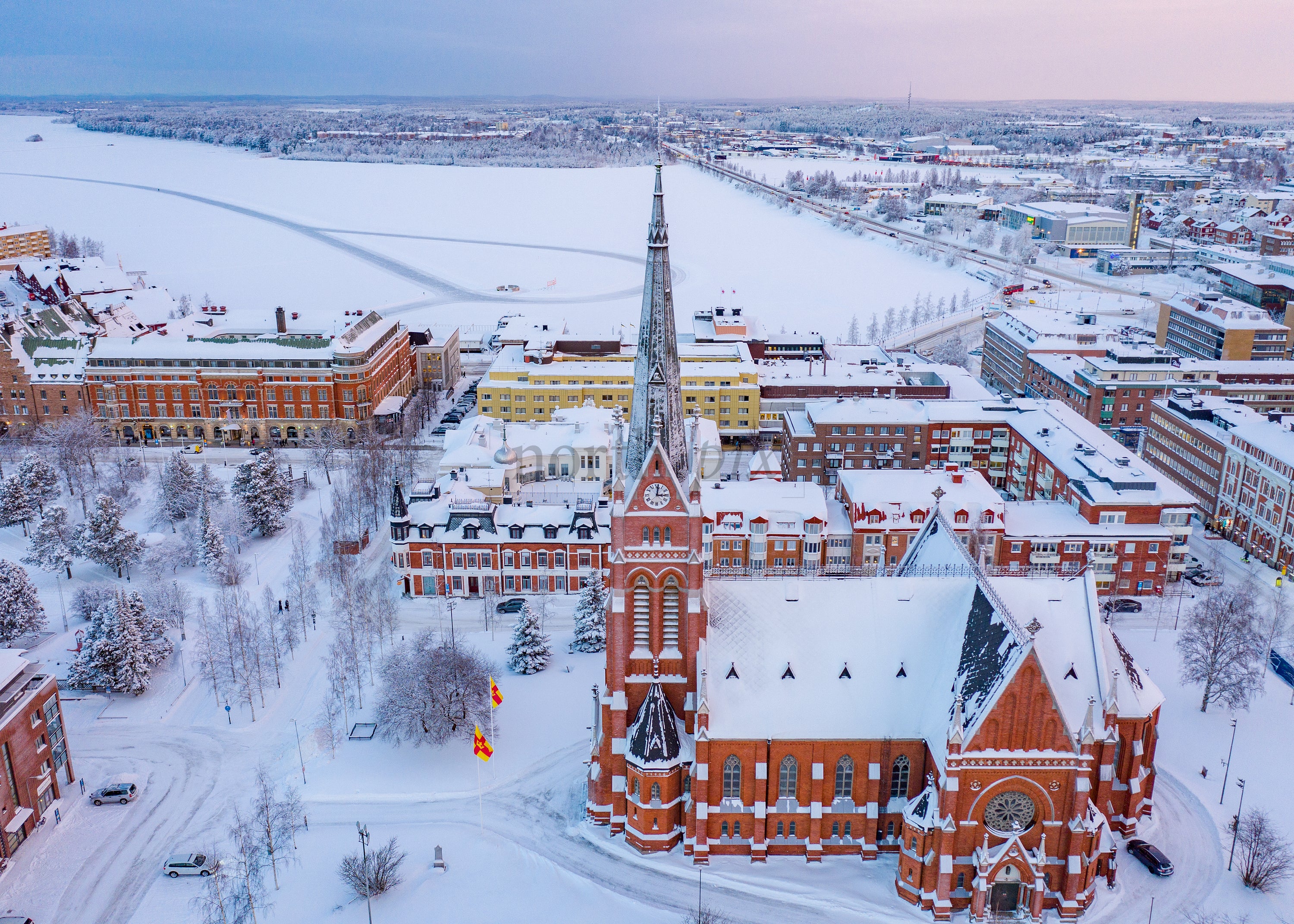 Aerial View of Snowy Luleå Cityscape and Cathedral During Winter