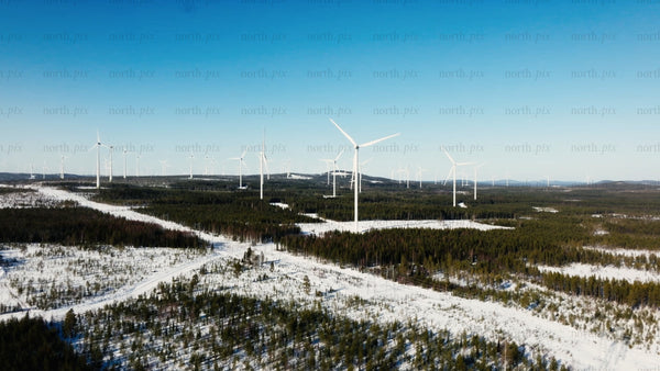 Markbygden wind farm: Aerial view of winter landscape and clean energy generation