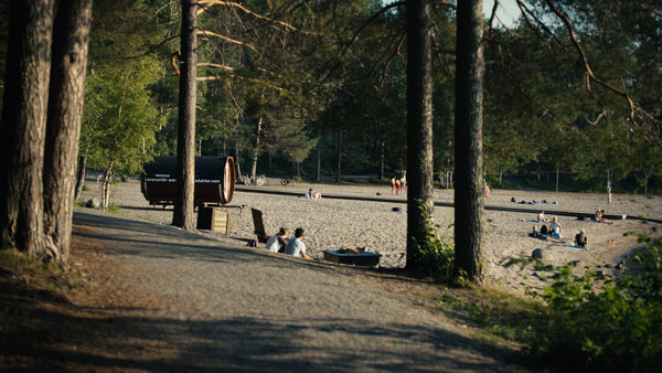 Man jogging near beach in Luleå during sunny summer day