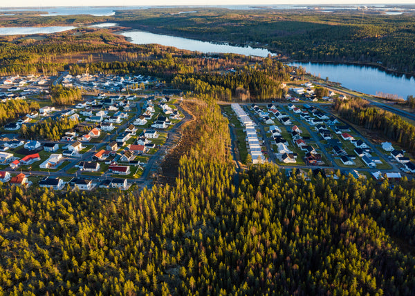 Overhead view of a Luleå suburban area during golden hour in spring