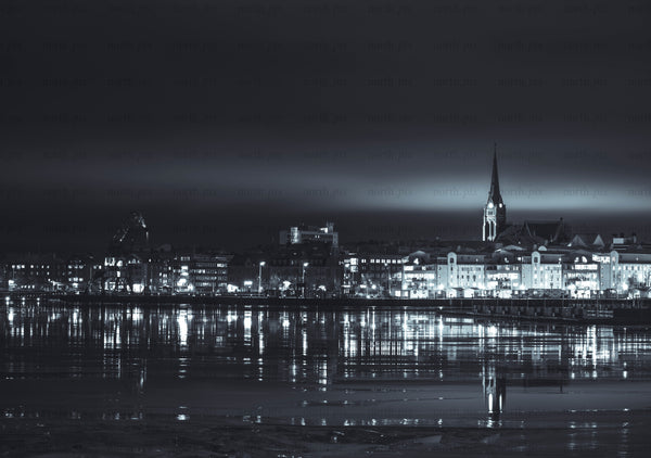 Night view of southern harbor with church steeple
