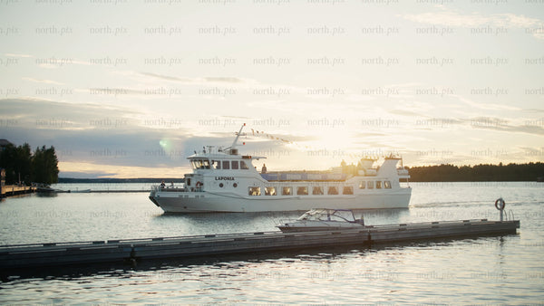 Tour boat Laponia on Luleå river at sunset in Luleå
