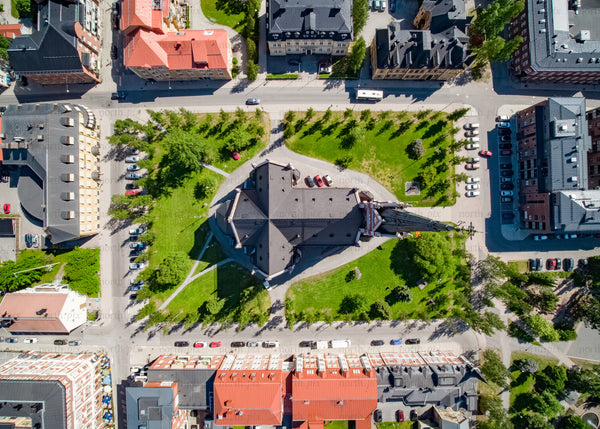 Drone view of urban park and buildings in Luleå during summer