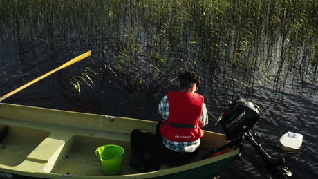 Checking Crayfish Traps: A Summer Fishing Scene in Luleå, Sweden
