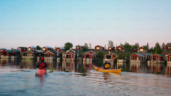 Kayaking in the Luleå archipelago on a bright summer evening