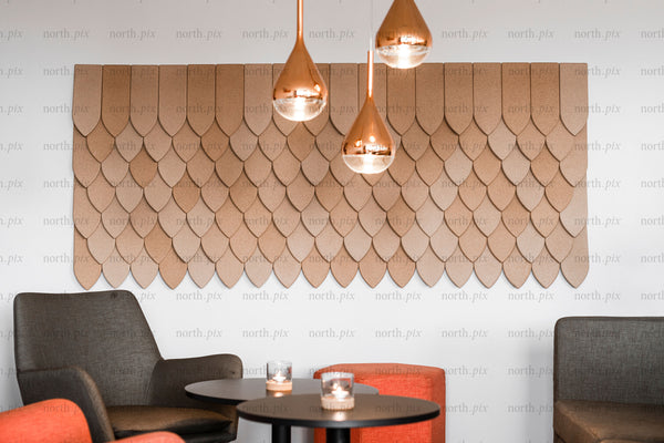 Lounge seating with decorative wall panels and pendant lights