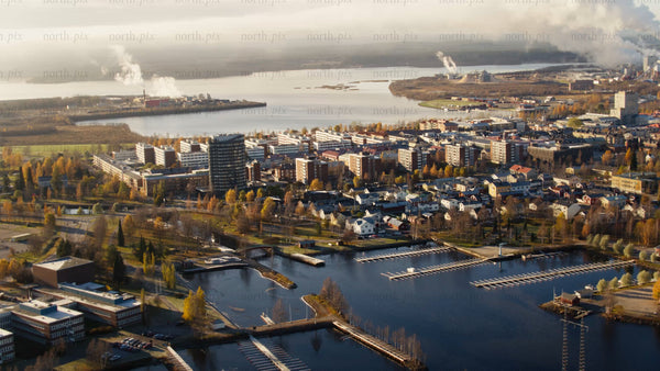 Piteå cityscape aerial view during autumn with marina and industrial backdrop
