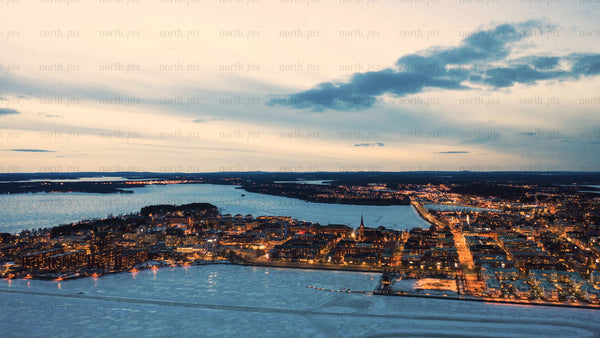 Luleå at dusk: A winter cityscape timelapse with frozen river