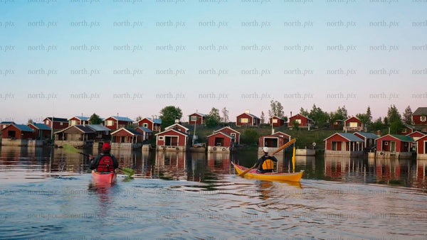 Kayaking in the Luleå archipelago on a bright summer evening