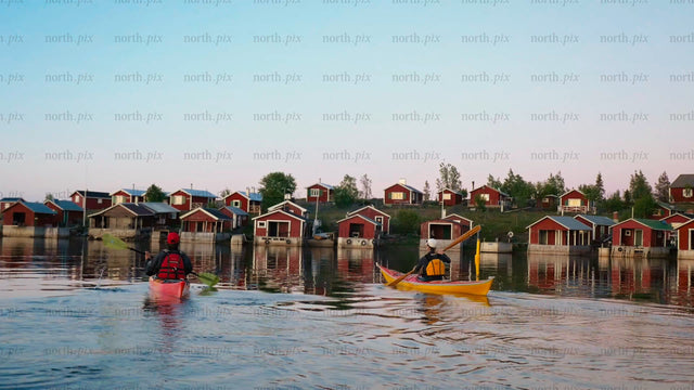 Kayaking in the Luleå archipelago on a bright summer evening