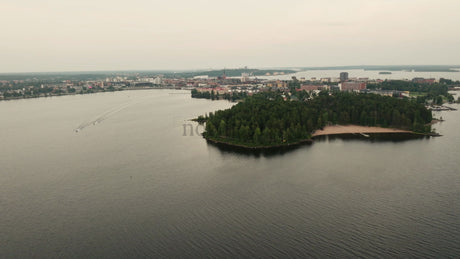 Aerial View of Luleå, Sweden: Motorboats on a Calm Summer Evening