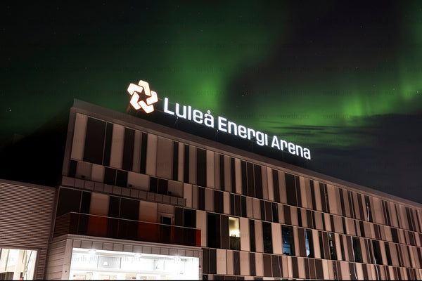 Luleå Energi Arena with aurora borealis at night