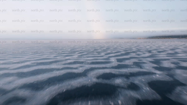 Frozen lake in arvidsjaur, Sweden - winter landscape drone footage