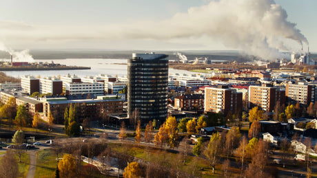 Scenic Autumn Aerial View of Piteå City, Showcasing Urban Development and Waterfront Industry