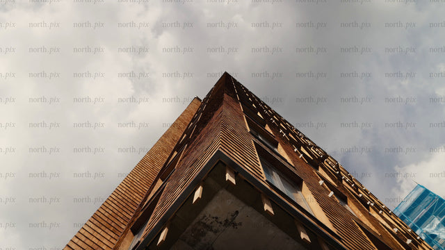 Modern wood building: Low angle view with upward pan of the wooden architecture