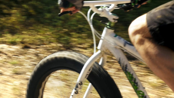 Fatbike biking POV: Summer day on a forest trail in Luleå