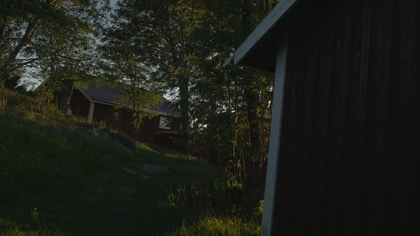 Summer Evening in Luleå Archipelago: Red Cabin by the Water