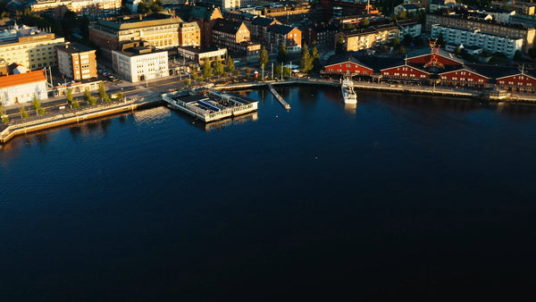 Summer sunset over Luleå: An aerial view of the city and harbor