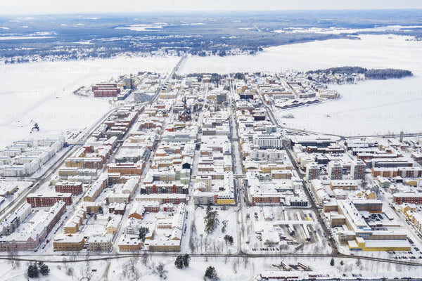 Aerial view of Luleå city center in winter snowy landscape from above