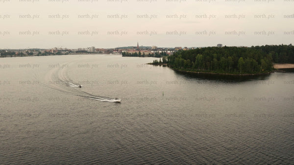 Summer evening boat trip in Luleå: An aerial perspective of coastal beauty