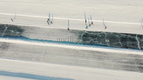 Winter Ice Skating on Frozen River in Luleå, Sweden - Aerial Drone View