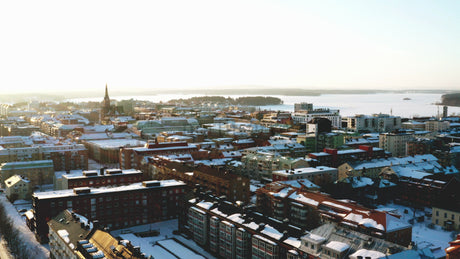 Lulea, Sweden in Winter: Aerial Drone Footage of City Center at Sunrise