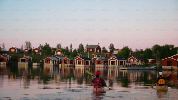 Kayaking in the Luleå archipelago at twilight