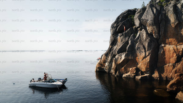 Cliff jumping at Huvön, Luleå/kalix archipelago Sweden: A bright summer day adventure