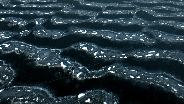 Aerial view of frozen lake in arvidsjaur, Sweden, winter landscape