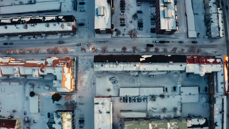 Aerial View of Snowy Lulea, Sweden, in Winter: A Drone's Perspective